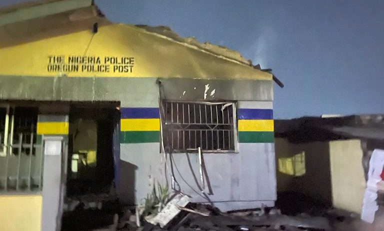 Probe begins as rampaging youths set police station ablaze